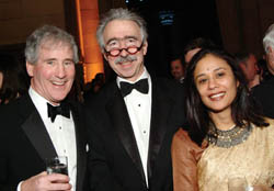 Dirks (center) and his wife with William Campbell '62.