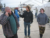 Photo of volunteers setting up a tent