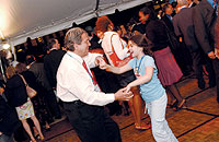 Photo of reunion attendees dancing