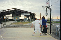 Photo of kids playing basketball