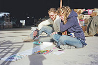 Photo of volunteers make a sign