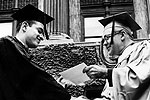 Roberts receives his degree from Associate Dean John W. Alexander ’39