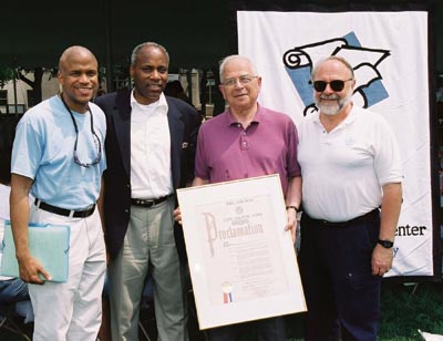 City Councilman Bill Perkins; Gerald Sherwin ’55, chairman, DDC Board of Friends; and Roger Lehecka ’67