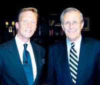 Burkett with Donald Rumsfeld.