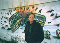 Burkett at a mural in Gaza City.