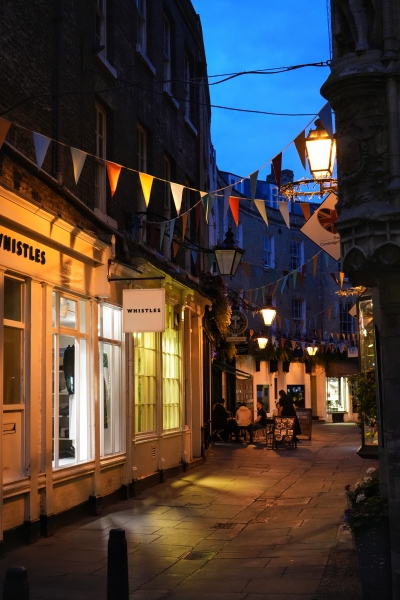 Photo of Rose Crescent in Cambridge England--a quaint lane with boutiques and restaurants in the early evening.