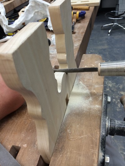 Scott refined the curves of the bench’s sides with differently shaped files before finishing them with sand paper. Photo: Scott Sonnenberg CC’18