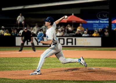 Tomas Lopez CC'25 pitching in baseball gam