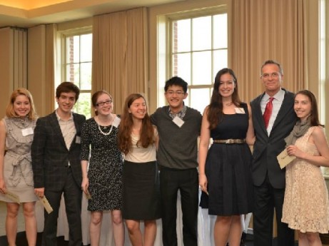 Dean James J. Valentini congratulates students at the 2013 Academic Awards ceremony.