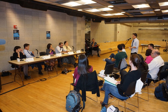 Brit Byrd CC'15 asks a question at a panel event during Voting Week. Photo: Kevin Gully