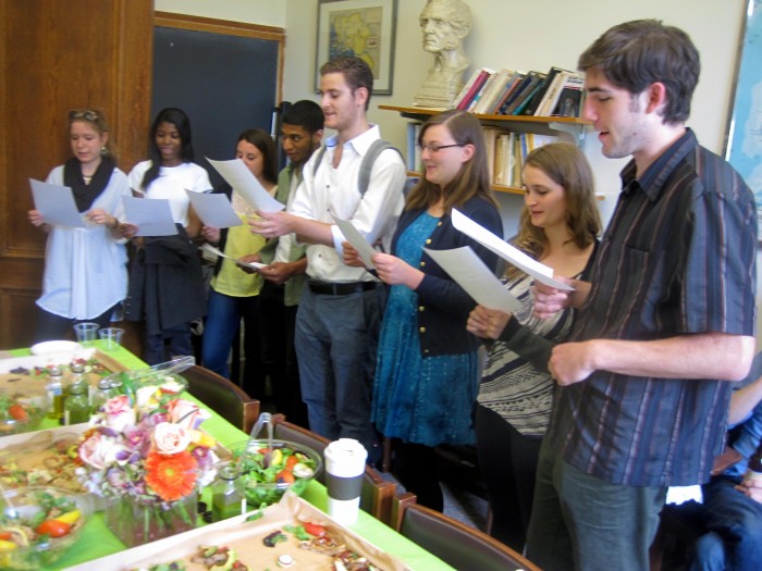 The 2014 Gamma Kappa Alpha inductees take their oath.