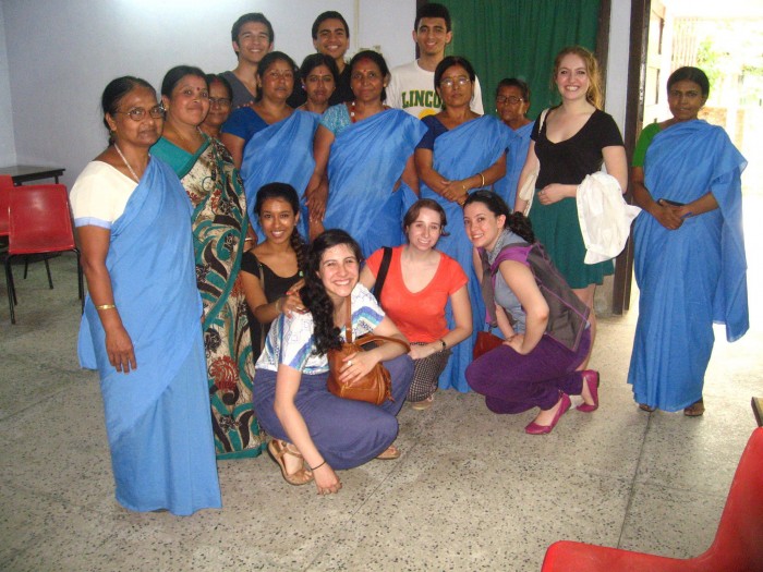 Chloé Durkin CC’15 (second from right) in Siliguri in West Bengal, India, on a program she helped to organize with the support of the Alternative Break Program, with women from a nearby village who had organized a rural women’s health clinic for their village. Photo: Courtesy Chloé Durkin CC’15