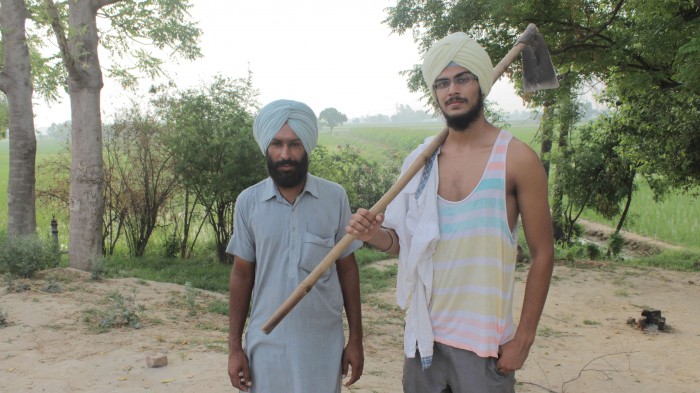 Angad Singh CC '16 (right) and Beant Singh, an organic farmer in the Bathinda province of Punjab. PHOTO: Courtesy of Angad Singh CC '16